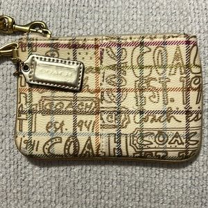 Coach wristlet gold accents
